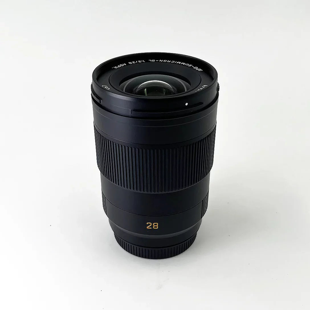 Leica -Summicron- 28mm f/2 Aspherical Lens + Padded Medium Sized Case + 67mm 3-Piece Filter Kit + Lens Cap Keeper + 6Ave Cleaning Kit